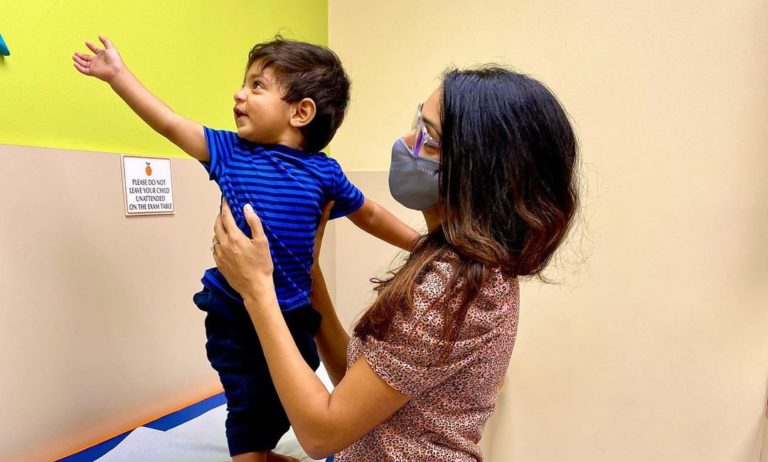 mom and toddler in peds office